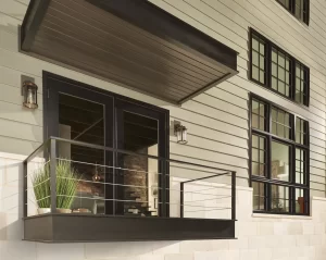Doors leading to a modern balcony is a style that is handled by Crown Point contractor.