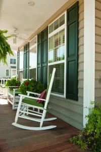 A front porch has windows installed by Schererville window company.