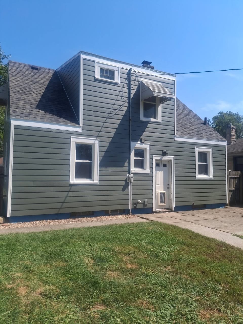 After - September 2026 - Ascend Composite Siding in Deep Moss with New Fascia, Crown Point, IN