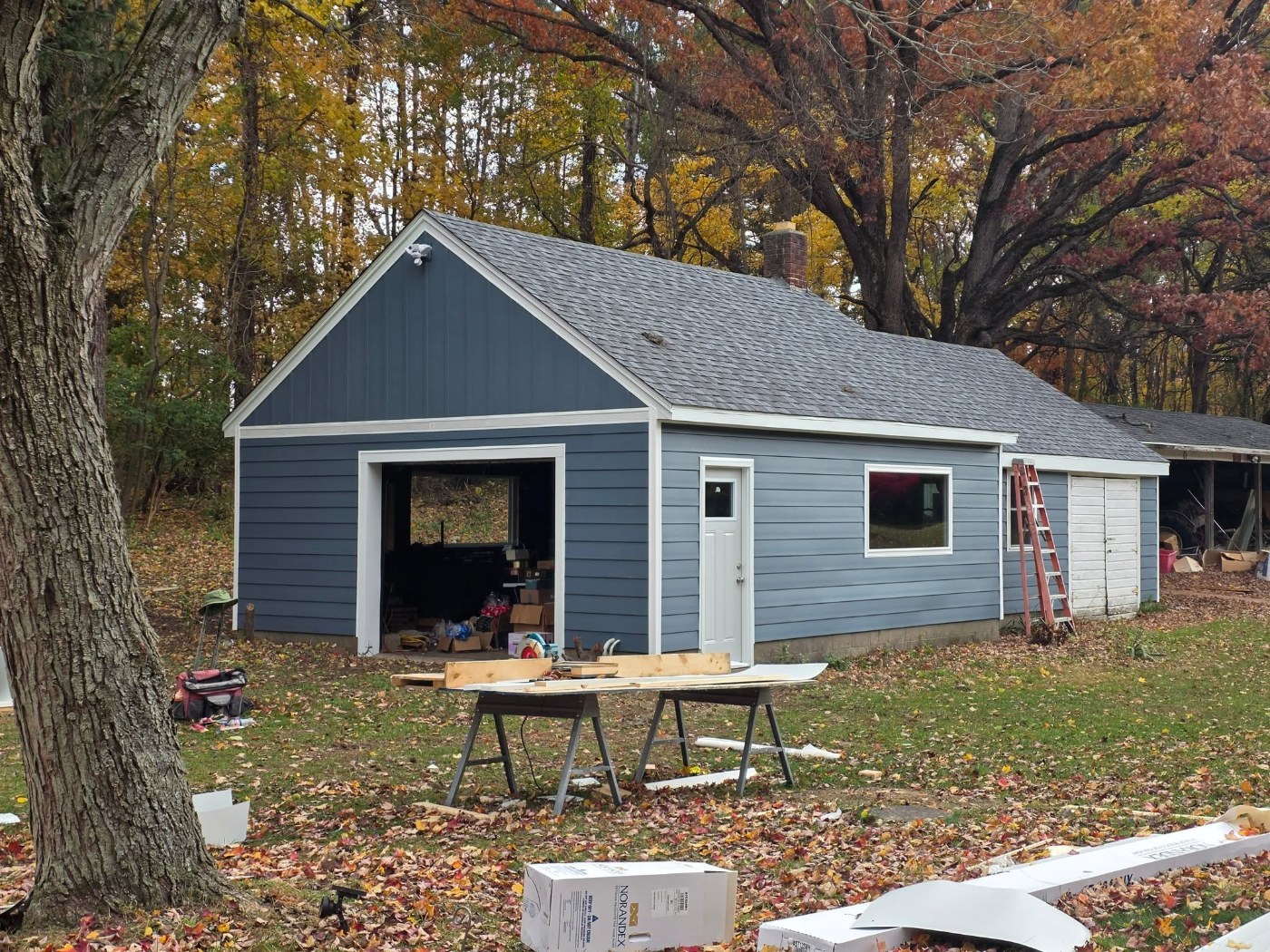 After - November 2025 - Full Makeover: New Roof, ProVia Windows and Ascend Composite Siding in Harbor Blue, Michigan City, IN